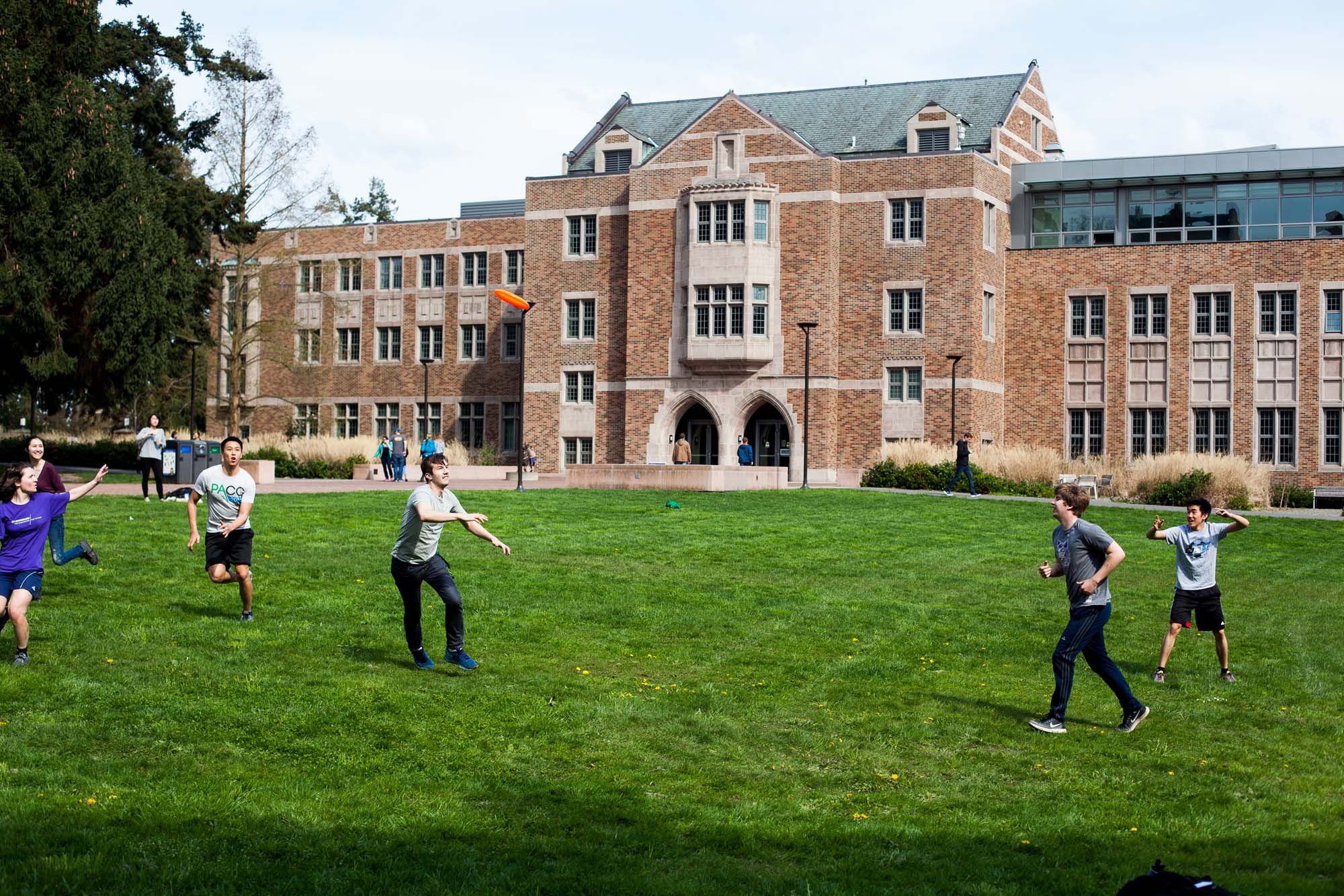 students on the lawn in front of the HUB